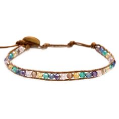 The Saturday Night single wrap bracelet is made with semi-precious stones and an adjustable cotton cord with three size options. Adjust to your perfect fit and snip off any excess cord. Colors: Purple, Green, Blue, Yellow, Rose, Brown Cord Materials: Crystal Beads, Coconut Clasp, Adjustable Cotton Cord Length: 6.5" (first closure), 8.5" (last closure) Handmade by female artisans in Thailand. Colors Purple, Bracelets Handmade Beaded, Coconut Shell, Women Artisans, Cotton Cord, Semi Precious Stones, Saturday Night, Yellow Rose, Purple Green