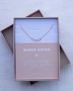 a box with two necklaces in it