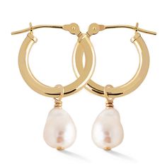 These 14K Gold Small Hoop earrings feature Baroque drop pearls. Classic and elegant, handmade in nyc. 14K Gold Freshwater Pearls Hypoallergenic, lead and nickel free Hoop Diameter 15mm x Thickness 2mm Pearl 9x6mm (size may vary slightly) Click Snap closure #ES045-GPL Gold Small Hoop Earrings, Drop Hoop Earrings, Small Hoop Earrings, Pearl Hoop Earrings, Gold Pearl, Pearl Drop, Snap Closure, Freshwater Pearls, Solid Gold