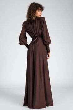 Step into sophistication with our long sleeve belt maxi dress, a fusion of understated elegance and modern sophistication. This exquisite garment features a sleek long-sleeve design complemented by a flattering belt, creating a timeless silhouette that exudes confidence and style. Handmade customization Fabric composition: 90% polyester fiber, 10% spandex Washing method: hand wash or dry clean Popular elements: belt Elegant Brown Maxi Dress With Long Sleeves, Classic Long Sleeve Brown Dress, Elegant Brown Long Sleeve Maxi Dress, Silk Dress Outfit Classy, Brown Fitted Long Sleeve Maxi Dress, Luxury Brown Long Sleeve Midi Dress, Civil Dress, Silk Dresses Outfit, Long Sleeve Silk Dress