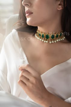 Upgrade your wardrobe with our necklace set. This refined set includes jade green stones and a dangling pearl to create a stylish look when paired with the matching earrings. By wearing these gems, you exude sophistication and exemplify refined beauty in a world full of distractions. Necklace Closure - Adjustable Dori, 70gm Earrings Closure- Push Back, 15gm (Pair) Handcrafted in Jammu and Kashmir J&K Crafts travels the depths of India to learn techniques and crafts from deep down in the local markets and villages. We give utmost importance to our quality and packaging. We aim to ensure you receive exactly what you are looking for and for your experience to be special and memorable. We are ready to help and advise you through your purchase. IT'S  A W E S O M E * Ethically Sourced, Indian ra Luxury Green Pearl Temple Jewelry Necklace, Luxury Green Formal Jewelry, Luxury Green Pearl Necklace In Temple Jewelry Style, Luxury Handmade Green Jewelry Set, Luxury Green Pearl Necklace For Festive Occasions, Luxury Green Beaded Bridal Necklace, Luxury Green Temple Necklace For Formal Occasions, Luxury Traditional Green Pearl Necklace, Luxury Green Ceremonial Jewelry