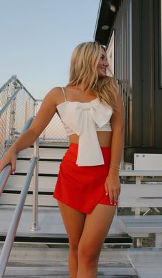 Stay cute and comfy on game day with The Tailgate Skort - the red skort that will keep you looking great while you cheer for your team! No need to sacrifice style for comfort - this skort is the perfect combination of both, and it's perfect for any fan that wants to show their spirit. Go team! available for in store credit or exchange (see policy for more info) filter used to brighten photos Summer Cheerleading Skort, White Athletic Shorts For Cheerleading In Summer, White Athletic Shorts For Summer Cheerleading, Red Short Skort With Built-in Shorts, Casual Summer Cheerleading Skort, Summer Skirt With Built-in Shorts For Cheerleading, Casual Mini Skirt With Built-in Shorts For Cheerleading, Red Bottoms For Cheerleading In Summer, Red Shorts For Summer Cheerleading