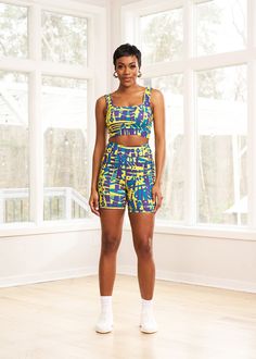 Style #: A2017NTSThe Adamma African Print Sports Bra makes for a stylish take on traditional activewear. The bold printed style can be worn to the gym with our Kimba biker shorts or with a pair of jeans for a night out with friends. Shop all our activewear here. Squared neckline Elastic band with D'IYANU logo on back Medium support Wicking properties 87% nylon/13% spandex​ Designed in the USA, Imported Cold wash. Tumble dry low. Model size: Small | Height 5'11" | Bust 34" | Waist 27" | Hips 38" Multicolor Activewear With Built-in Shorts, Summer Streetwear Activewear Shorts, Trendy Summer Sports Bra For Streetwear, Trendy Sports Bra For Summer Streetwear, Spring Activewear With Built-in Shorts For Streetwear, Spring Short Length Gym Activewear, Spring Streetwear Activewear With Built-in Shorts, Trendy Streetwear Sports Bra For Summer, Trendy Summer Streetwear Sports Bra