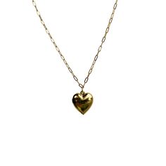 This sweet, timeless necklace features our puffy heart charm on our medium cable chain. Tarnishing is a bummer, so we plate our jewelry in a luxuriously-thick layer of gold for extra longevity. The 18" chain is lightweight, strong, and can be clasped anywhere for various lengths. Assembled in our Charleston, SC studio. **If you want a similar necklace with multiple charms, please click here to build your custom necklace.** CARE: Gold-plated brass chain. Made in the U.S.A. Hart proudly plates her