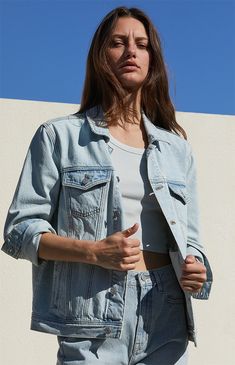 Upgrade your casual ensemble with the Denim Trucker Jacket from PacSun. Crafted from rigid denim, this timeless piece features a button-down front closure, classic collar, button-flap chest pockets, and side hand pockets, offering both style and versatility for your everyday wear.


	Light indigo wash
	Rigid fabric
	Collar
	Long sleeves
	Button-down front closure
	Button-flap chest pockets
	Side hand pockets
	Relaxed fit
	100% cotton
	Machine washable
	Model is wearing a size small
	Model measurements: 5’9” height, 32” bust, 24” waist, 34” hip