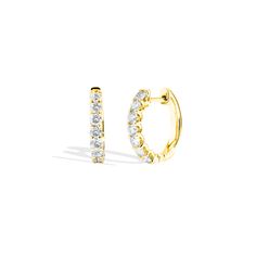 Serve a glamorous look with these 1/2" pair of huggies. These timeless hoops are crafted with 18k gold. Each earring is finished off with 7 gorgeous 0.80 ct. diamonds. Luxury Yellow Gold Diamond Huggie Earrings, Gold Huggie Diamond Earrings, Pierced, Luxury Gold-tone Huggie Earrings For Women, 14k White Gold Diamond-cut Huggie Earrings, Luxury 14k Gold Diamond-cut Huggie Earrings, Diamond Huggie Earrings, Huggies Earrings, Gold Diamond, 18k Gold