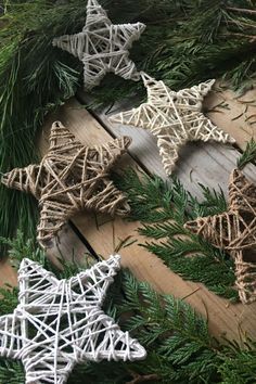 christmas decorations made out of string and pine needles