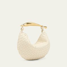 Bottega Veneta top handle bag in  intrecciato  leather  Sardine metal top handle  Chain shoulder strap Can be worn as a top handle or shoulder bag  Open top with magnetic closure  Approx. 7.9"H x 13"W x 1.6"D Made in Italy Sardine Bag, Bag With Chain, Bottega Veneta Intrecciato, String Bag, 6 D, Open Top, Handle Bag, Leather Top, Magnetic Closure