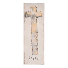 a cross with the word faith painted on it