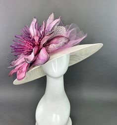 Ivory Oval Hat adorned oversized purple floral bloom. Adorned with netting and the jeweled bee, my signature mark on all of my designer pieces. This piece is adjustable with an internal elastic to fit crown size 22.5" and smaller. Please measure prior to purchasing as all sales are final. Searching for a custom piece? Please contact me via email: TheHatHive@gmail.com for details and pricing. Don't forget to follow us on Instagram @TheHatHive Yellow Fascinator, Fascinator Hats Diy, Church Lady Hats, Derby Hats Fascinators, Bridal Hat, Feather Decor, Kentucky Derby Hats, Feather Flower, Kentucky Derby Hat