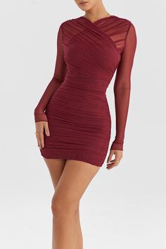 Features: This Two Layer Mesh Skinny Mini Dress is designed to enhance your figure and make a statement at any night club party. The two layers of mesh create a sheer effect while the long sleeves and backless design add a touch of sexiness. The dress also features a zipper for easy wear and a bodycon fit to flatter your curves. Perfect for a night of dancing and fun, this dress is a must-have for any fashion-forward woman. Long Sleeve Mesh Dress With Ruched Detail, Stretch Mesh Dress With Sheer Sleeves, Mini Length, Stretch Mesh Mini Dress With Sheer Sleeves, Sheer Fitted Mesh Dress For Party Season, Ruched Long Sleeve Mesh Dress For Date Night, Sheer Stretch Long Sleeve Mesh Dress, Sheer Stretch Mesh Dress With Long Sleeves, Long Sleeve Mesh Dress With Stretch, Fitted Long Sleeve Ruched Mesh Dress