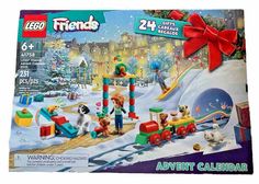 the lego friends christmas train set is in its box and it's ready to be opened