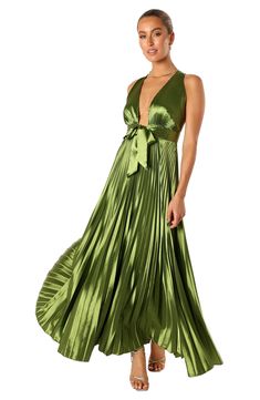 Glossy green satin plays up the sweet pleats shaping a sultry dress designed with a deeply dipped neckline and a strappy back. Hidden back-zip closure Plunge neck Adjustable straps Partially lined 100% polyester Hand wash, dry flat Imported Satin Dresses Long, Satin Dresses Long Sleeve, Martini Olive, Black Tie Wedding Guests, White Dress Shoes, Elegant Maxi Dress, Resort Dresses, Floral Dresses Long, Pleated Maxi Dress