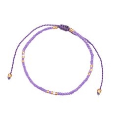 Get ready to dive into a world of purple paradise with our fabulous Purple Beaded String Bracelets, straight from the heart of Bali's artisanal scene! Handcrafted with passion and flair, each bracelet is a burst of color and creativity, designed to make you stand out in style. Choose from a dazzling array of purple hues and styles, from lilac purple to bright indigo—there's something for every taste and mood. Mix and match to create your own unique stack or share the love with your friends by gifting them as friendship bracelets! Our adjustable design ensures a comfortable fit for everyone, so you can dance, play, and live your best life with ease. Whether you're stacking them up or rocking them solo, these vibrant accessories are sure to turn heads and spark conversations wherever you go. Adjustable Tiny Beads Wrap Bracelet Gift, Adjustable Tiny Beads Spiritual Bracelets, Adjustable Spiritual Beaded Bracelets With Tiny Beads, Spiritual Adjustable Beaded Bracelets With Tiny Beads, Adjustable Round Beads For Friendship, Adjustable Length Beaded Bracelets As Gift, Adjustable Round Friendship Beads, Adjustable Hand-strung Friendship Bracelet, Hand-strung Adjustable Beaded Bracelet