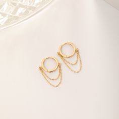 Solid 14K 18K Gold Huggie Earrings, Small Minimalist Tiny Round Hoop Earrings for Women and Teens, Dainty Hoop Earring, Valentines Day Gift 📘 D E T A I L S * Solid Gold (real gold, no gold-filled or no gold plated material) * Karat: 14K (585), 18K (750) * Gold color: Yellow, rose, and white Width: 1.7 mm approx. Outer diameter: 12 mm approx. Inner diameter: 9 mm approx. The thickness of the chains is 0.95 mm Measurements may vary slightly due to handwork. 🎁 P A C K A G I N G * All items are ni Dainty Yellow Gold Hoop Earrings With Adjustable Chain, Gold-plated Yellow Gold Dangle Cartilage Earrings, Gold Tarnish-resistant Dangle Cartilage Earrings, Dainty Gold-plated Hoop Earrings With Adjustable Chain, 14k Yellow Gold Filled Dangle Cartilage Earrings, Gold Dangle Hoop Earrings With Chain Detail, Gold Dangle Hoop Earrings With Chain, Yellow Gold Tarnish Resistant Dangle Cartilage Earrings, Tarnish Resistant Yellow Gold Dangle Cartilage Earrings