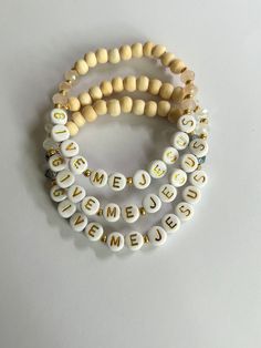 Based on the well known hymn "Give Me Jesus" (African American Spiritual). Handmade bracelet, made durably, and will fit an average adult wrist size of 6.5-6.75 inches. This bracelet is handmade with a combination of natural blonde wood, gold,  and either opaque light pink, opaque white, or steely blue faceted glass beads. Please choose your color of choice when checking out! FREE SHIPPING Handmade Inspirational Stretch Bracelet As Gift, Handmade Inspirational Stretch Bracelet Gift, Inspirational Handmade Stretch Bracelet As Gift, Inspirational Handmade Stretch Bracelet Gift, Inspirational Handmade Name Bracelet For Everyday, Everyday Inspirational Handmade Name Bracelet, Inspirational Handmade Name Bracelet, Inspirational Handmade Bracelets For Everyday, Spiritual White Friendship Bracelets For Everyday