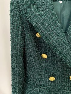 Arabella Emerald Green Tweed Blazer for Women - Slim Fit Ladies' double-breasted emerald green outfit with a peak collar design and a classic double-breasted button closure. Crafted from premium woolen fabric for a touch of elegance and sophistication. Unique shade of emerald green adds a modern twist to the traditional silhouette. Gold buttons complement the color scheme and enhance the luxurious look of the outfit. Slim-fit design tailored to flatter the female figure, allowing you to make a s Green Tweed Jacket For Fall Workwear, Green Tweed Outerwear For Business, Green Tweed Outerwear For Office, Green Tweed Jacket With Button Closure For Fall, Green Long Sleeve Tweed Jacket For Winter, Elegant Green Tweed Jacket For Business, Elegant Green Tweed Business Jacket, Green Spring Tweed Jacket For Office, Green Tweed Business Outerwear