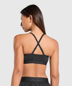 Gymshark Ruched Sports Bra - Black | Gymshark Sporty Sports Bra With Strappy Back And Built-in Padding, Athleisure Training Bra With Adjustable Straps, Sporty Workout Bra With Adjustable Straps, Black Sports Bra With Adjustable Straps And Medium Support, Sporty Workout Bra With Cross Back, Sports Racerback Bra With Adjustable Straps, Sports Bra With Adjustable Racerback Straps, Sporty Cross Back Bra For Workout, Compressive Sports Bra With Adjustable Straps