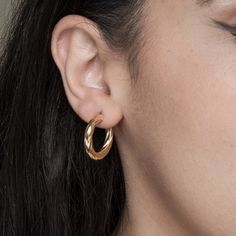 A twist on classic gold hoops, these twisted hoops will make you feel stylish no matter what you are wearing. Perfect for everyday wear and designed to last, add them to your ear party or let them fly solo. Pair with: silver twisted hoops twisted gold + silver hoop set Details: Solid 10k Yellow Gold Sold as a pair 4X15MM Hand Made with Love in NYCCustom JewelryShips in 5-10 Business DaysFree shipping on all US orders Modern Twist Small Hoop Earrings, Modern Twist Hoop Earrings As Gift With Polished Finish, Modern Twist Polished Hoop Earrings As Gift, Modern Twist Hoop Earrings For Everyday Wear, Modern Twist Yellow Gold Hoop Earrings For Everyday, Modern Twist Everyday Hoop Earrings, Gold Plated Hoop Earrings With A Modern Twist, Trendy Twisted Everyday Hoop Earrings, Trendy Twisted Hoop Earrings For Everyday