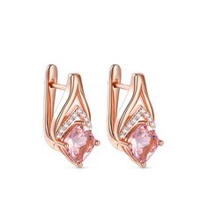 Crafted with the utmost precision and attention to detail, these earrings are a testament to our commitment to exceptional craftsmanship. At the heart of these captivating earrings lies a mesmerizing cushion-cut morganite stone, radiating a delicate blush hue that symbolizes love and compassion. Its soft curves and facets create a dance of light, captivating all who behold its beauty. Surrounding the magnificent morganite are a delicate row of sparkling white stones, adding a touch of brilliance Formal Pink Gold Gemstone Earrings, Elegant Pink Heart Earrings For Anniversary, Exquisite Gemstone Diamond Earrings, Formal Rose Gold Plated Hoop Earrings, Exquisite Diamond Earrings For Pierced Ears, Pink Formal Hoop Earrings In Fine Jewelry Style, Rose Gold Plated Earrings As A Gift, Formal Rose Gold Earrings With Ear Wire, Rose Gold Drop Earrings For Anniversary