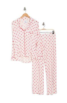 A soft jersey knit pajama set with a pretty print delivers feminine style and essential comfort. 2-piece set Shirt: 25" length (size S); Pants: 9.5" rise, 32" inseam (size S) Shirt: notch lapel, long sleeves, front button closures, chest patch pocket, allover print, contrast piping, knit construction Pants: elasticized waist, pull-on style, allover print, knit construction 95% rayon, 5% spandex Machine wash cold Imported Model’s stats for sizing: 5’11” height, 32” bust, 24” waist, 34” hips. Mode White Printed Loungewear Sets, Printed Sets With Relaxed Fit For Lounging, Long Sleeve Printed Loungewear Sets, Long Sleeve Printed Lounging Sets, Printed Long Sleeve Lounging Sets, Long Sleeve Printed Lounge Sets, Printed Relaxed Fit Sleep Sets, Printed Sets With Relaxed Fit For Sleep, White Matching Set Sleepwear For Loungewear