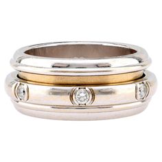 Brand: Piaget Center Stone: 7 Diamonds Cut: Round Brilliant Cut Weight: Approximately Color: G Clarity: VS Metal: 18K White Gold Era: Vintage Circa: 1997 Hallmarks: Signed, Numbered and Purity Marks Size: 5.5 and can't be resized Gram weight: 13.18 This vintage Piaget ring from 1997 is a sophisticated piece crafted in 18K white gold. The ring features seven round brilliant-cut diamonds, each showcasing a stunning G color and VS clarity, making them sparkle brilliantly. The ring is marked with Pi Piaget Ring, Colored Stone Engagement Rings, Platinum Diamond Engagement Rings, Gold Cocktail Ring, Platinum Engagement Rings, White Gold Diamond Rings, Wedding Rings Vintage, Stone Engagement Rings, Diamond Shop