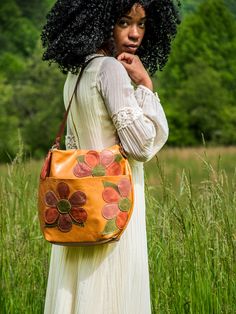 Product Description: Y'all! I am OBSESSED with this bag: The Marie! In LIMITED RUN Flower Power Eco-Tanned leather with coordinating leather tassel! This leather is everything. Comes unlined with an internal phone pocket, or choose to add a lining to your new beauty here: https://inbluehandmade.com/products/add-a-lining-to-my-new-bag-41075?_pos=1&_psq=add%20a%20lining&_ss=e&_v=1.0&variant=44005823283433 Hurry! These are limited-run! Please allow 3-4 weeks for us to make this beautiful bag by han Spring Crossbody Hobo Bag With Adjustable Strap, Bohemian Shoulder Bag With Adjustable Strap For Fall, Bohemian Bags With Adjustable Strap For Fall, Spring Hobo Bag With Detachable Strap For Daily Use, Spring Hobo Bag With Detachable Strap For Travel, Spring Crossbody Hobo Bag For On-the-go, Spring Travel Hobo Bag With Detachable Strap, Bohemian Shoulder Bag For Spring, Bohemian Style Shoulder Bag For Spring