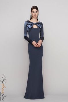 Looking for a stunning gown that will turn heads? The Frascara 4119 is a gorgeous option that features a bow-detailed neckline and satin contrast bodice. The fit and flare silhouette is flattering on any figure, and the hidden back zipper makes it easy to get in and out of. Plus, the satin lining ensures a comfortable wear all night long. Made from 80% triacetate and 20% polyester, this gown is sure to become a favorite in your wardrobe. Fitted Dress With Bow Tie Back For Gala, Formal Fitted Dress With Bow Tie Back, Elegant Fitted Gown For Dinner, Elegant Fitted Dinner Gown, Elegant Dresses With Bow And Fitted Bodice, Elegant Bow Tie Back Dress For Wedding, Fitted Gown With Bow Tie Back For Formal Occasions, Elegant Formal Evening Dress With Back Opening, Elegant Evening Gown With Back Zipper