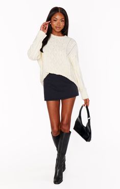 A closet staple you will be wearing on repeat! This classic cream cable knit is just what you need to build your year round wardrobe. Finish out warm days with your fave denim shorts, a layer over collared shirts and under jackets when the temperatures drop. Chic Cable Knit Sweater For Day Out, Spring Cable Knit Sweater For Everyday, Trendy Winter White Cable Knit Sweater, Bell Bottoms And Sweater, Denim Skirt Outfit Winter, Sweater With Skirt, White Bachelorette Party Outfit, White Bachelorette, Maternity Dress Outfits