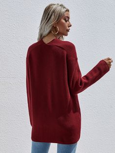 Our Marjorie Knit comes in solid tone print. It features a v neckline, long relaxed sleeves and a textured knit pattern all over the garment. This knit is perfect for layering during the cold winter months! Size Guide: Melina is 5’6” tall, and has a 33.5” bust, 24.8”waist, & 37.4” hips. She is wearing a S / US 4 / AU 8. This knit sweater is true to size. Material: 50% Acrylic, 30% polyamide, 20% polyester. Key Features: Relaxed fit. V neckline. Pull on style. Care Instructions: Machine wash / Co Oversized Textured Knit V-neck Outerwear, Fall V-neck Sweater With Ribbed Neckline, Oversized V-neck Sweater For Fall, Winter V-neck Textured Knit Cardigan, Winter Textured Knit V-neck Cardigan, Long Sleeve V-neck Sweater For Layering, Ribbed V-neck Sweater For Layering, Textured Knit V-neck Outerwear, Oversized V-neck Ribbed Outerwear