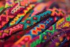 close up view of multicolored beaded fabric