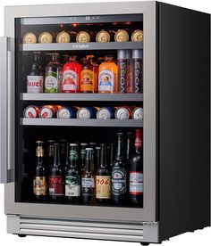 an open refrigerator filled with lots of different types of beer and liquor bottles in it