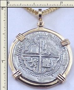 #4-765   Replica   2 Reale Pendant  14K Solid Gold Bezel   Atocha Silver Coin    $375.00      Add $350.00 For The 20" 14K Solid Gold Diamond Cut Rope Chain 2mm    Add $40.00 For A 20" Sterling Silver  Link Chain 2mm Pocket Watch