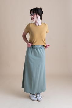 The Lounge Maxi Skirt is both flattering and simple, this skirt is a fantastic way to lounge or it can be dressed up and taken out for dinner or work. It travels well, and looks great with our crop tees and cardigans. Our Lounge Collection features the softest and stretchiest organic cotton French Terry! You can freely move or lounge in long-lasting 95% organic cotton and 5% spandex. Feel completely at ease in soft earth tones, 4-way stretch, and fabric that is just so flattering for all bodies. Soft Earth Tones, The Lounge, Work It, Sustainable Clothing, Athletic Wear, Bike Shorts, Crop Tee, Yoga Leggings, Earth Tones