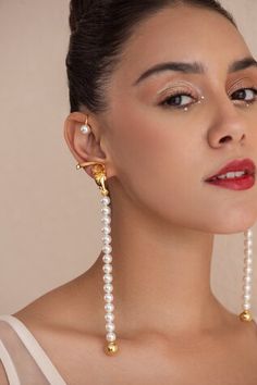 22k gold plated, 925 silver base ear cuffs handcrafted with carved work bird detailed top and white Swarovski pearls embellished long tassel. - Aza Fashions Elegant Sterling Silver Clip-on Ear Cuff, Luxury Ear Cuff For Pierced Ears For Formal Occasions, Luxury Pierced Ear Cuff For Formal Occasions, Luxury Pierced Ear Cuff For Formal Events, Elegant Dangle Clip-on Ear Cuff, Elegant Pierced Ear Cuff For Evening, Luxury Formal Pierced Ear Cuff, Elegant Dangle Ear Cuff For Party, Elegant Evening Pierced Ear Cuff