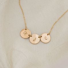 "Monogram Necklace, GOLD Initial Disc Charm Necklace, Birthday, Bridesmaid Gifts, Mother's Jewelry, Child, Family, Personalized Jewelry Very simple yet timeless necklace for everyday, bridal's party or birthday gift. This necklace can also look good with another necklace for a layered style or by itself. Circle Disc Necklace - size Medium * Thick Medium size disc .... approx. 7/16\" OD (11mm) * Each pendant will be smooth around the edges and put on your texture into a complete beautiful product Monogram Necklace Gold, Timeless Necklace, Layered Style, Mother Jewelry, Monogram Necklace, Gold Initial, Disc Necklace, Necklace Size, Necklace Sizes