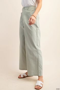 These 100% linen pants will take you from the final days of summer to right into fall. We love the idea of layering them with a oversized chunky cardigan or cropped piece! They are a beautiful light sage, have a zipper front with button, front bucket pockets, a cute wide leg fit and belt hoops. Fit: Run true to size with no stretch Fabric: 100% Linen Available for in-store pickup, use code LOCAL at checkout Knee Length Dresses Casual, Dressy Sweaters, Dressy Shorts, Dressy Skirts, Blue Denim Pants, Dressy Pants, Lightweight Pants, Chunky Cardigan, Activewear Sets