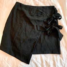 Adorable Black Skirt, Never Worn Just Too Small. Elegant Black Skirt For Brunch, Fitted Black Bottoms For Brunch, Black Wrap Pencil Skirt For Workwear, Black Pencil Wrap Skirt For Workwear, Black Pencil Wrap Skirt For Work, Chic Black Asymmetrical Wrap Skirt, Black Lined Wrap Skirt For Work, Chic Black Wrap Skirt For Work, Fitted Black Skirt For Brunch