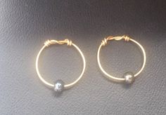 "Replica of beautiful temple rings made based on multiple findings. Diameter approximately 1-1 1/8\" (2.5-3 cm) Temple rings made of brass with various glass beads. Just pick the option you like the best. Those temple rings will be perfect addition to your Slavic costume. They will work for SCA, Adrian empire, and Living history events. If you would like to have similar temple rings made of different material: copper or sterling silver, or with a different beads (gemstone or glass) just message Adjustable Small Hoop Stackable Jewelry, Nickel-free Copper Ring, Spiritual Nickel-free Round Beads Jewelry, Artisan Stackable Round Jewelry, Spacer Beads Small Hoop Jewelry For Gift, Small Hoop Spacer Beads Jewelry For Gift, Small Hoop Spacer Beads Jewelry As Gift, Artisan Round Spacer Beads Jewelry, Copper Spacer Beads Jewelry