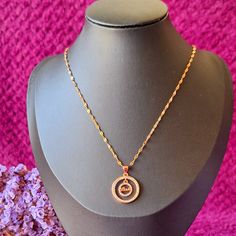 Presenting the Love Circle Necklace, a captivating piece that beautifully combines elegance and charm. Featuring a sparkling circular pendant with the word "Love" delicately inscribed, this necklace is designed to be a symbol of affection and sophistication. The pendant is surrounded by dazzling CZ stones that add a touch of brilliance to your look. . Material: 18k rose gold-plated,  stainless steel . Pendant Size: Width 1.5 cm, Height 1.5 cm . Chain length: 18inch with an adjustable clasp . Occasion: Ideal for everyday wear, special events, or as a thoughtful gift for someone special. . Gift: Perfect for birthdays, anniversaries, or just to show appreciation. .Features:HypoallergenicAnti-tarnishDurable and long-lasting Rose Gold Heart Pendant Necklace For Her, Rose Gold Heart Necklace With Clavicle Chain For Anniversary, Rose Gold Heart Pendant Necklace Gift For Her, Rose Gold Jewelry For Valentine's Day, Rose Gold Clavicle Chain Jewelry For Anniversary, Rose Gold Round Heart Necklace For Wedding, Rose Gold Round Jewelry For Valentine's Day, Pink Gold Necklaces For Mother's Day Anniversary, Rose Gold Heart Necklace For Wedding