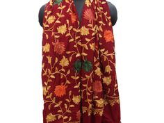 Pattern - red Kashmiri shawl with floral embroidery. Ideal for - women. Occasion - formal or casual. Fabric - cotts wool, it is a blend of cotton and wool which is very soft and has a fine texture. Color - maroon. On maroon background, embroidery is in different colored threads all over displaying floral patterns. Size - Width - 41 x 80 inches approx. Care- gentle hand wash. For more such scarves please visit- https://www.etsy.com/in-en/shop/vibrantscarves?ref=seller-platform-mcnav&section_i Elegant Burgundy Embroidered Dupatta, Traditional Floral Embroidered Shawl For Winter, Traditional Embroidered Winter Scarves, Traditional Winter Shawl With Floral Embroidery, Winter Festive Embroidered Scarves, Elegant Red Scarf For Festive Season, Elegant Red Shawl Dupatta, Elegant Red Dupatta Shawl, Elegant Red Festive Scarf