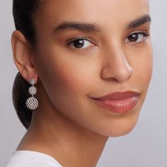 Three graduated sterling silver Caviar beaded spheres form these unique drop earrings. Sterling Silver Teardrop Beaded Earrings, Elegant Dangle Silver Beads Jewelry, Elegant Silver Beaded Sterling Silver Earrings, Silver Beads Jewelry For Evening, Elegant Silver Beaded Dangle Jewelry, Elegant Silver Pierced Beaded Earrings, Elegant Silver Beaded Pierced Earrings, Elegant Silver Teardrop Beaded Earrings, Elegant White Earrings With Silver Beads