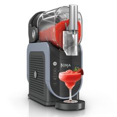 an image of a juicer with a drink in it