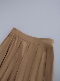 This Cotton Pleated Skirt-Tan is a must. The classic pleated design adds a touch of sophistication, making it perfect for both casual and formal occasions. Formal Fitted Mini Skirt With Accordion Pleats, Elegant Workwear Skort With Accordion Pleats, Elegant Summer Skort In Solid Color, Elegant Mini Skirt With Pleated Hem For Fall, Chic Formal Mini Skirt With Accordion Pleats, Summer Formal Mini Skirt With Lined Skirt, Elegant Skort With Pleated Hem, Formal Summer Mini Skirt With Lined Skirt, Formal Fitted Pleated Mini Skirt