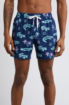 Lightweight and perfectly stretchy, these lined swim trunks move easily in the water and dry quickly on land for comfort no matter where you take them. 5 1/2" inseam; 22" leg opening; 11" front rise; 14 1/2" back rise (size Medium) Lined 92% polyester, 8% spandex Machine wash, tumble dry Imported Casual Swim Trunks For Swimming, Casual Swim Trunks For Warm Weather Swimming, Casual Swim Trunks For Warm Weather, Casual Nylon Swim Trunks For Poolside, Hawaiian Style Short Swimwear For Swimming, Casual Swim Trunks For Pool In Warm Weather, Go-dry Bottoms For Beach, Go-dry Bottoms For Beach Season, Navy Swim Trunks For Vacation Beach Season