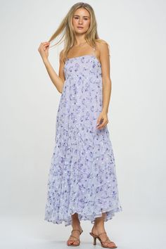 A gorgeous ditsy floral pattern flows throughout this whimsical asymmetric tiered maxi dress. Embroidery detail and unique seaming give a luxe, feminine feel to this warm-weather style. Pair with slide sandals or block heels to elevate the look. Product Details Material: 100% Polyester. Fit: True to size. Body length: 52" from shoulder to hem (size Small). Fabric: Lightweight chiffon.Features: Adjustable spaghetti straps, asymmetric tiers, raised hemlines, embroidered white flowers, fully lined. Ditsy Floral Pattern, Dress Embroidery, Lilac Dress, Maxi Dress Cotton, Dinner Dress, Cotton Maxi, Tiered Maxi Dress, Menswear Inspired, Ditsy Floral