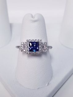 "Thanks for shopping our vintage estate store. We tend to sell well below wholesale and truly hope you enjoy all of our items. Many of the items are one of a kind, so please enjoy scrolling through the pictures and hopefully something will catch your eye. Brown spots are from camera. Estate Sterling Silver 925 lab created princess cut 1/2ct tanzanite cz 1cts diamonds ring. This is a custom made item from our shop, meaning we added the gem to the setting. Ring size: please select a size Setting: Classic Cubic Zirconia Diamond Ring Stamped 925, Classic Birthstone Promise Ring Stamped 925, Princess Cut Cubic Zirconia Sapphire Ring For Anniversary, Classic Princess Cut Cubic Zirconia Birthstone Ring, Classic Princess Cut Birthstone Ring For Anniversary, Classic Sapphire Wedding Ring Stamped 925, Classic Sapphire Ring With Vs Clarity In Sterling Silver, Classic Princess Cut Sapphire Ring For Anniversary, Classic Sterling Silver Sapphire Ring With Vs Clarity