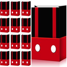 red and black boxes with white circles on the sides are stacked up in front of each other