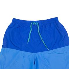 Item is in good used condition. >Size: XL >Waist Size: 30" >Inside Leg: 8" >Rise: 13.5" >Hem: 13.5" Casual Blue Swim Trunks With Built-in Shorts, Sporty Blue Swim Trunks With Built-in Shorts, Blue Nylon Sports Bottoms, Sports Blue Nylon Bottoms, Blue Nylon Sportswear Bottoms, Casual Blue Swim Trunks With Elastic Waistband, Blue Swim Trunks With Pockets For Sports, Blue Athletic Shorts With Elastic Waistband For Streetwear, Blue Sportswear Bottoms For Sports