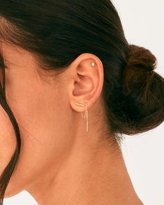 These minimalist bar threader earrings for women can be worn in multiple ways: let them dangle freely or wrap around your second piercing! These timeless dangle earrings are plated for a long-lasting finish that is nickel free, lead-free, and hypoallergenic. Description: Measurements: Chain Length: 2.4" (60mm); Thickness: 0.95mm; Horizontal Bar: 1.5x10mm 925 Sterling Silver Post. 14K yellow gold or Rhodium plated. Minimalist Dangle Threader Earrings, Everyday Delicate Chain Threader Earrings, Minimalist Linear Earrings, Dainty Everyday Threader Earrings, Dainty Dangle Ear Cuff, Everyday Delicate Chain Linear Earrings, Everyday Linear Earrings With Delicate Chain, Minimalist Ear Climbers For Gift, Delicate Threader Earrings With Adjustable Chain